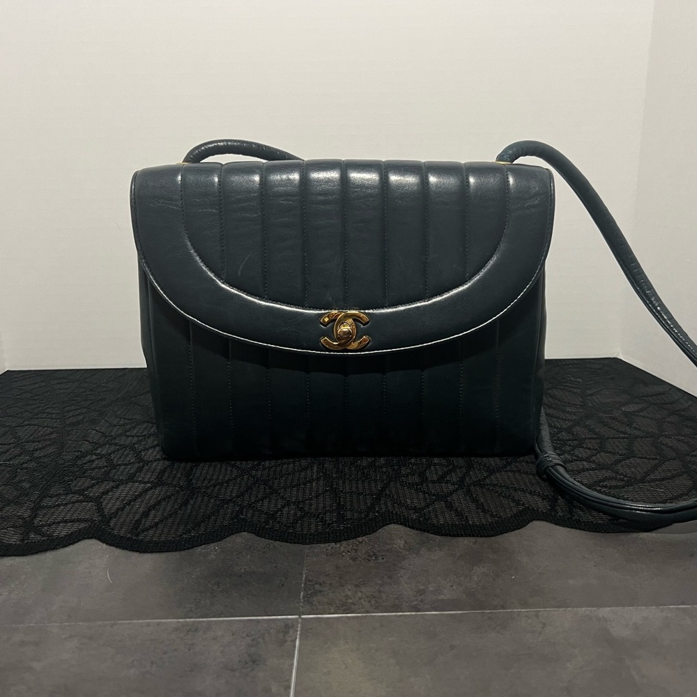 Authentic, vintage CHANEL black with gold hardware